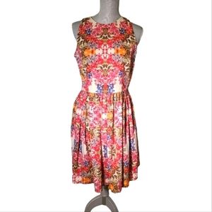 Maggie London sleeveless floral knee length dress with pockets size 8.